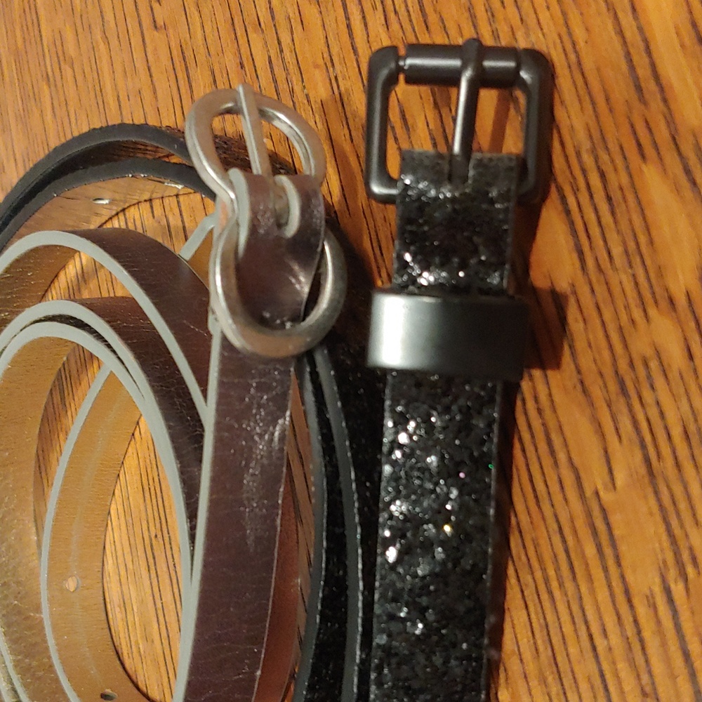 Pair of skinny belts size large, black sparkle and silver